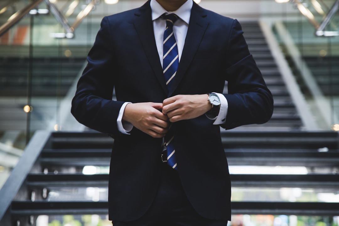 Business professional representing buy hold sell decision analysis for commercial real estate