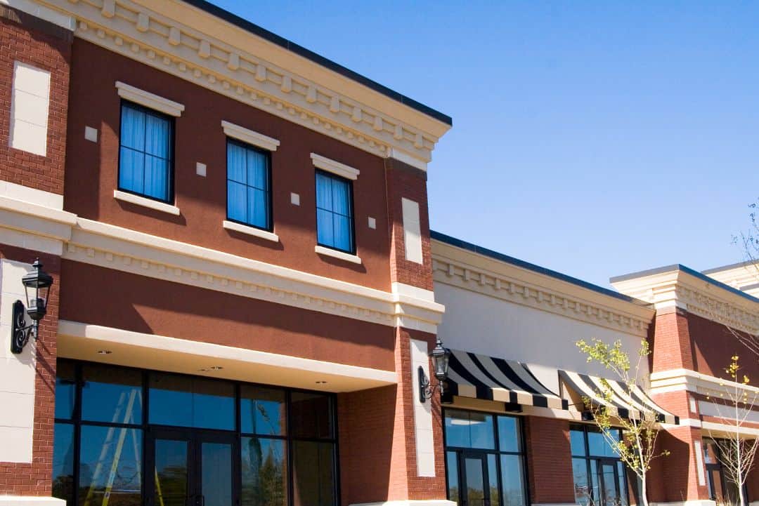 Retail storefronts representing commercial retail tenant mix and property valuation factors