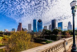 Houston downtown skyline representing commercial real estate market and industrial property broker opinion of value