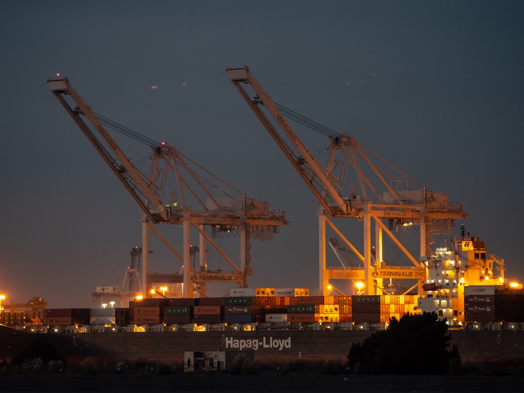 Port of Oakland California shipping cranes representing East Bay industrial property broker opinion of value