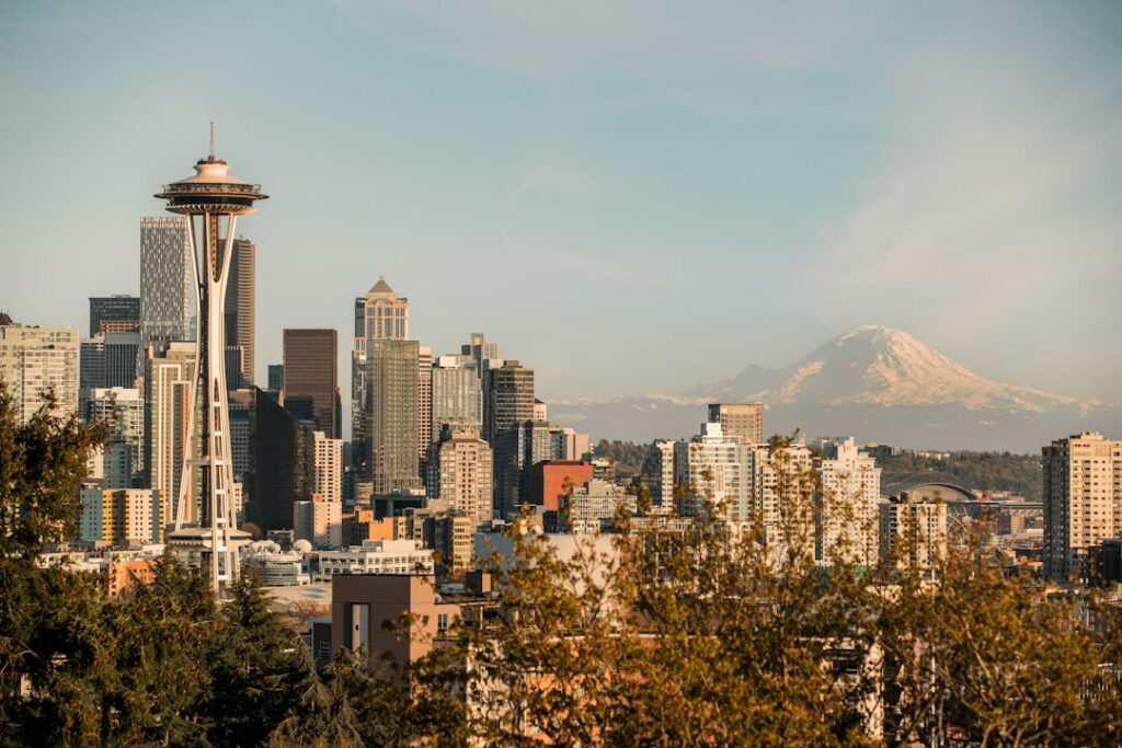 Seattle Washington skyline over Kerry Park with Mount Rainier representing commercial real estate and broker opinion of value